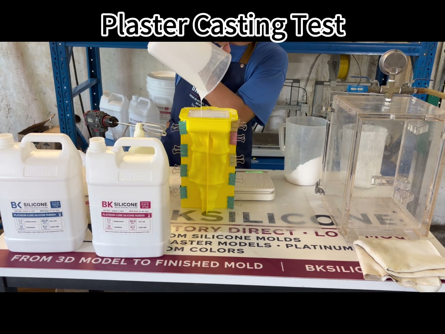 Fresh white plaster Athena statue being demolded from the yellow silicone mold